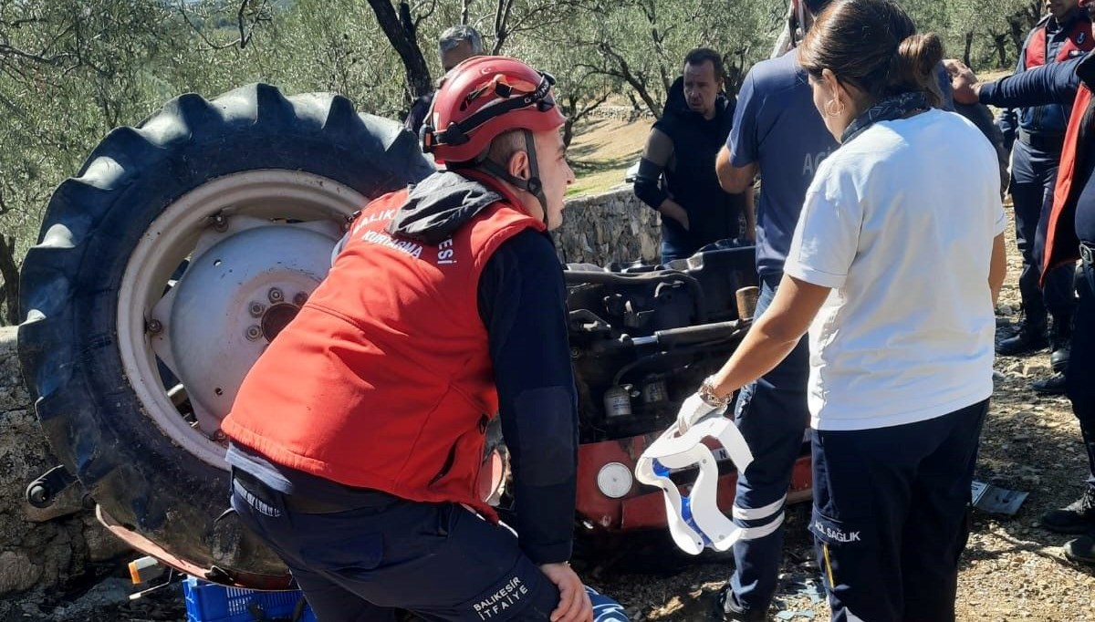 balikesirde traktor devrildi surucu yaralandi HpUExErV